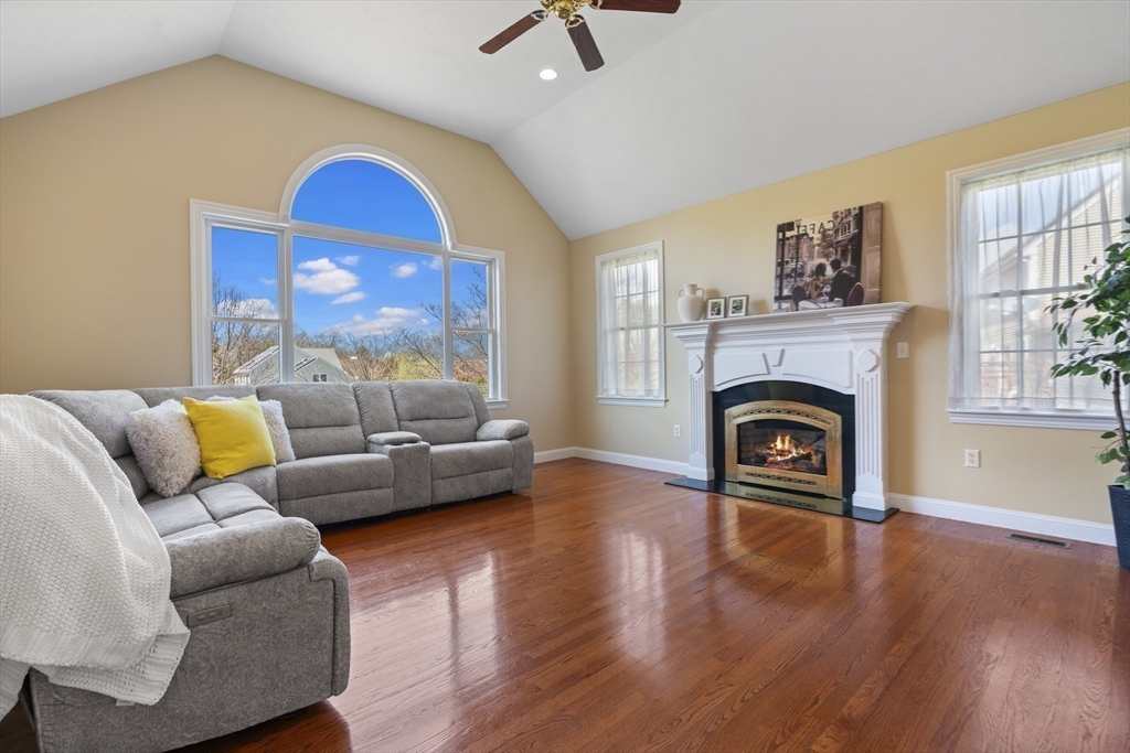 18 Ridgewood Street Ashland, MA 01721 - Photo 22 of 40 a living room with furniture and a fireplace