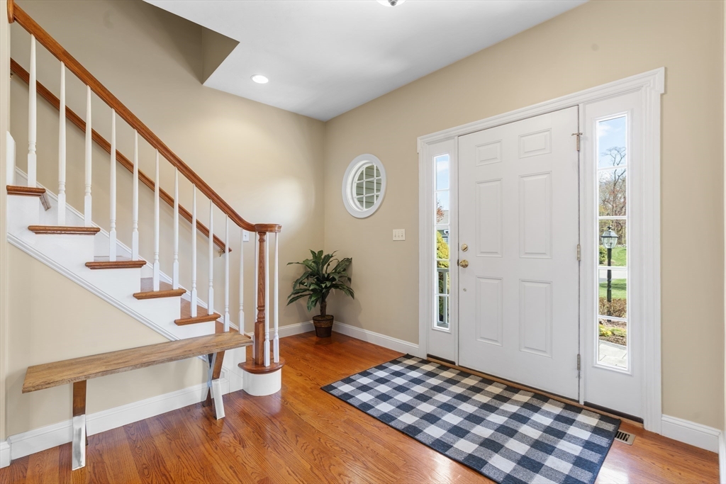 18 Ridgewood Street Ashland, MA 01721 - Photo 8 of 40 a view of an entryway with wooden floor