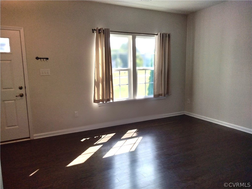 5300 Sandy Ridge Court Chesterfield, VA 23832 - Photo 12 of 39 an empty room with wooden floor and windows