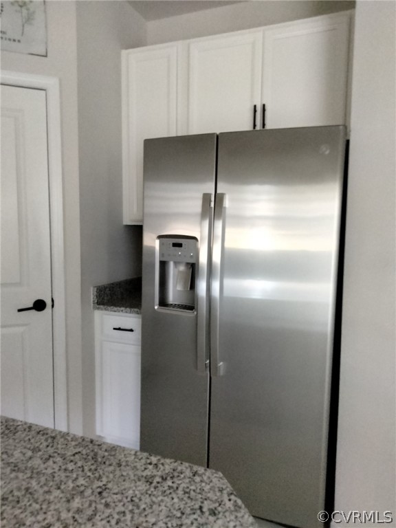 5300 Sandy Ridge Court Chesterfield, VA 23832 - Photo 21 of 39 a kitchen with a refrigerator and cabinets