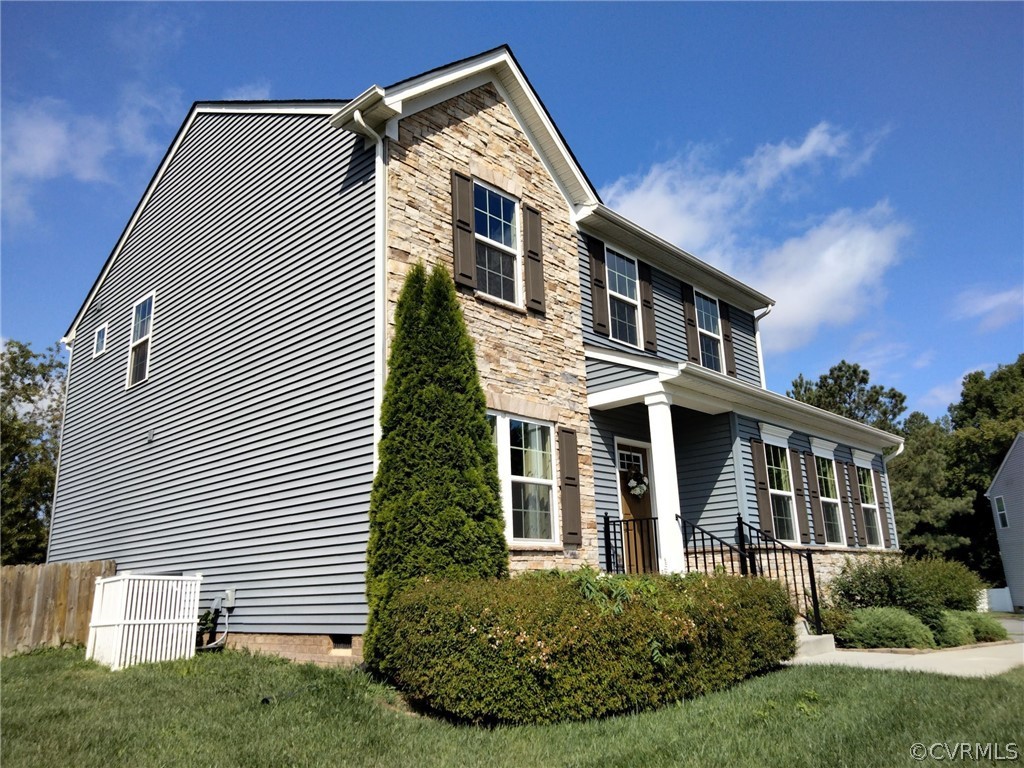 5300 Sandy Ridge Court Chesterfield, VA 23832 - Photo 3 of 39 a front view of a house with a yard