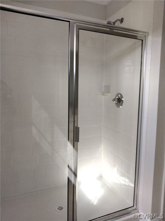 5300 Sandy Ridge Court Chesterfield, VA 23832 - Photo 34 of 39 a bathroom with a glass shower door