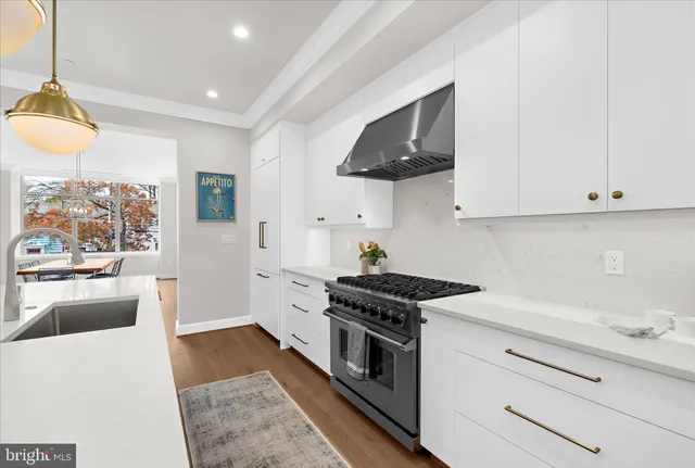 a bed room with a bed and a lamp