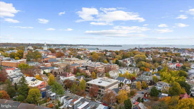 a view of a balcony with wooden floor