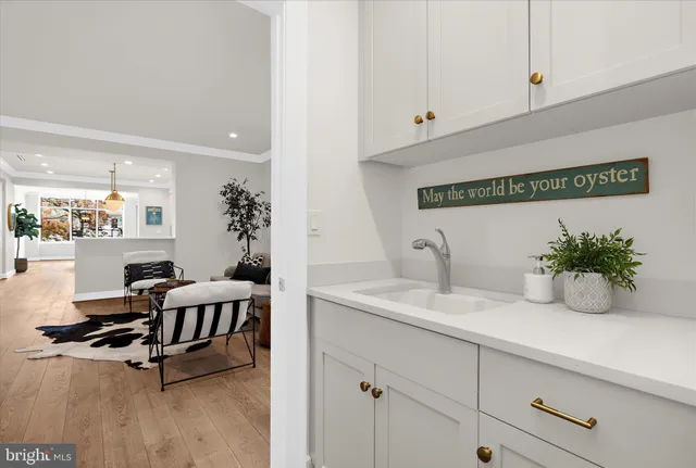 a view of balcony with couch and wooden floor