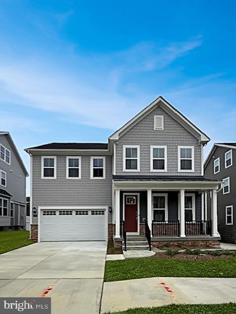116 Stilly Way Annapolis, MD 21403 - Photo 1 of 21 a front view of a house with garden