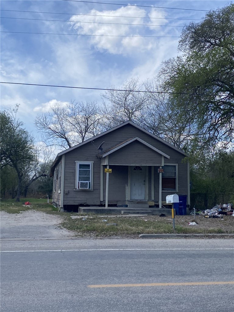 1309 Beam Station Road Alice, TX 78332 - Photo 2 of 4 a front view of a house with a yard