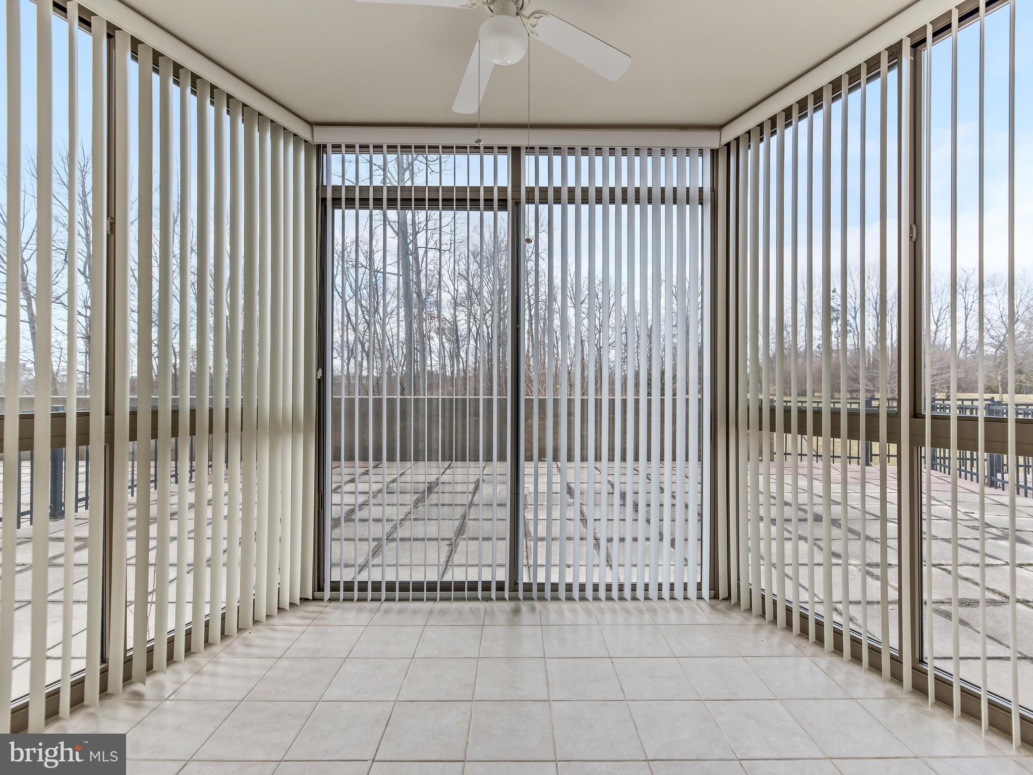 19365 Cypress Ridge Terrace, Unit 104 Leesburg, VA 20176 - Photo 14 of 16 Sunroom