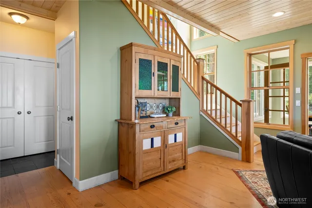 a view of a hallway with windows