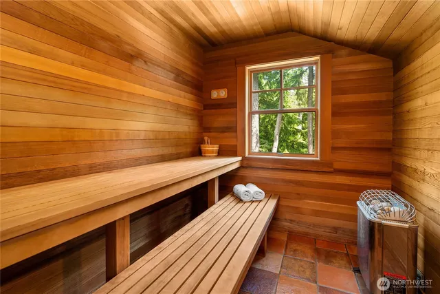 a view of a two chairs in the balcony