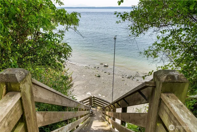 a balcony with view of palm trees