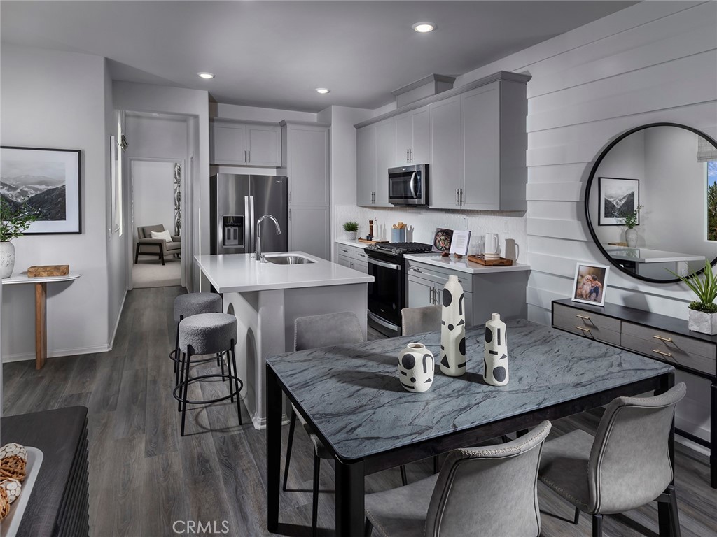 4727 Merida Way Oceanside, CA 92057 - Photo 4 of 13 Photo is not of the actual home, but is an inspirational photo of builder’s model home and may depict options, furnishings, and/or decorator features that are not included