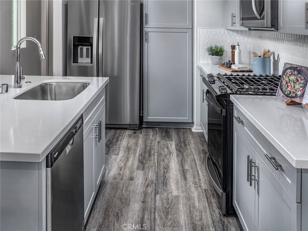 4727 Merida Way Oceanside, CA 92057 - Photo 6 of 13 Photo is not of the actual home, but is an inspirational photo of builder’s model home and may depict options, furnishings, and/or decorator features that are not included