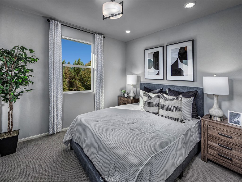 4727 Merida Way Oceanside, CA 92057 - Photo 8 of 13 Photo is not of the actual home, but is an inspirational photo of builder’s model home and may depict options, furnishings, and/or decorator features that are not included