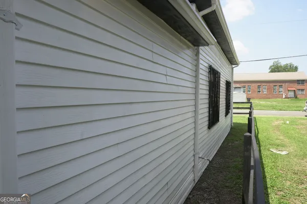 a balcony view with a garden