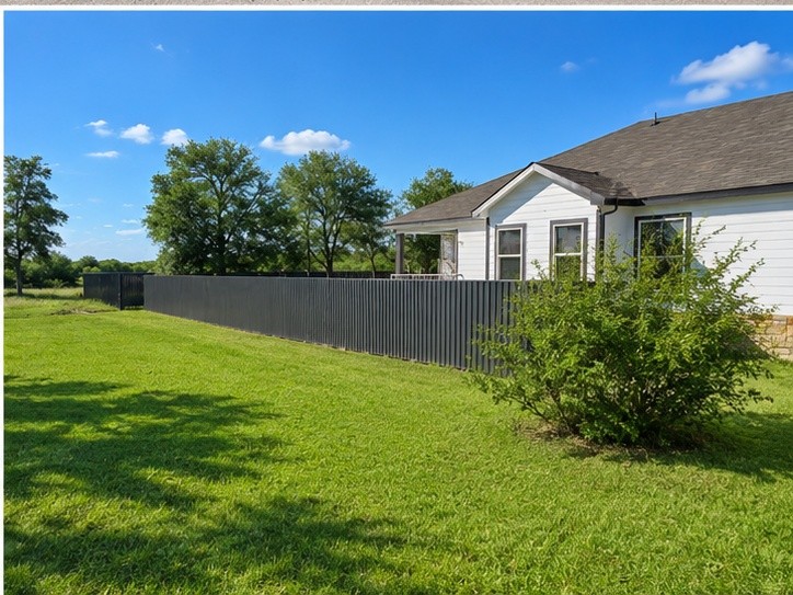 217 Gato Road Cedar Creek, TX 78612 - Photo 1 of 40 a front view of a house with a yard