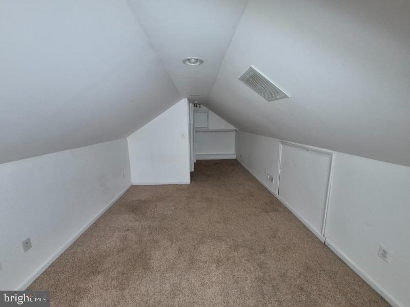 215 Sycamore Road Glen Burnie, MD 21060 - Photo 16 of 16 Cozy attic space with sloped ceilings.