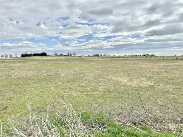 a view of a city with an ocean