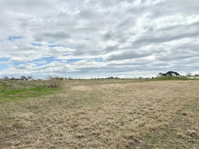 a view of an ocean and mountain