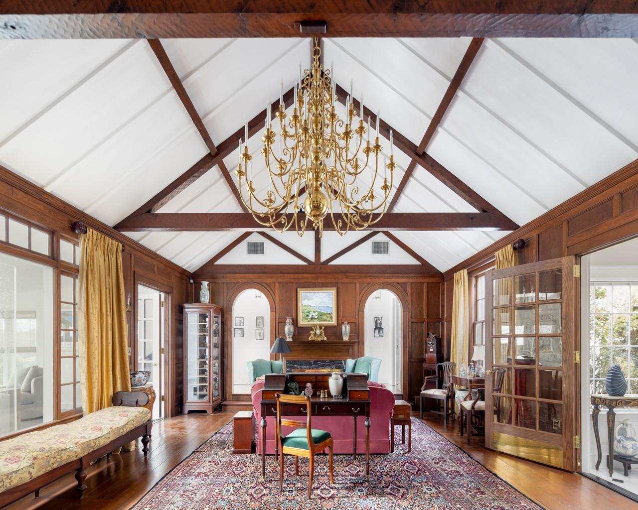 16 Point Road Bellport, NY 11713 - Photo 12 of 34 a living room with furniture and a large window