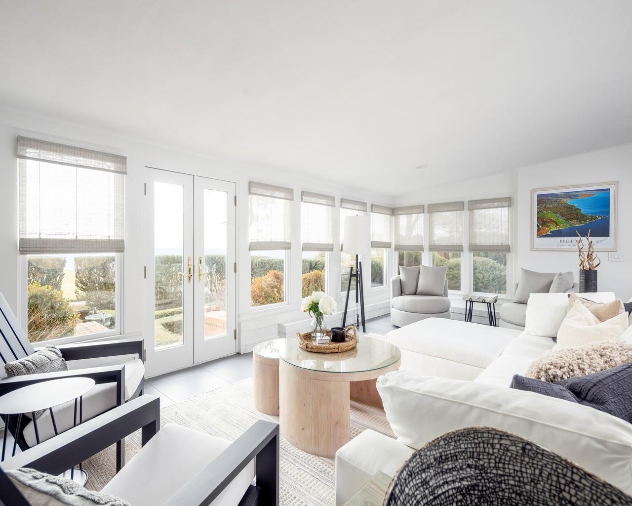 16 Point Road Bellport, NY 11713 - Photo 14 of 34 a living room with furniture and a large window