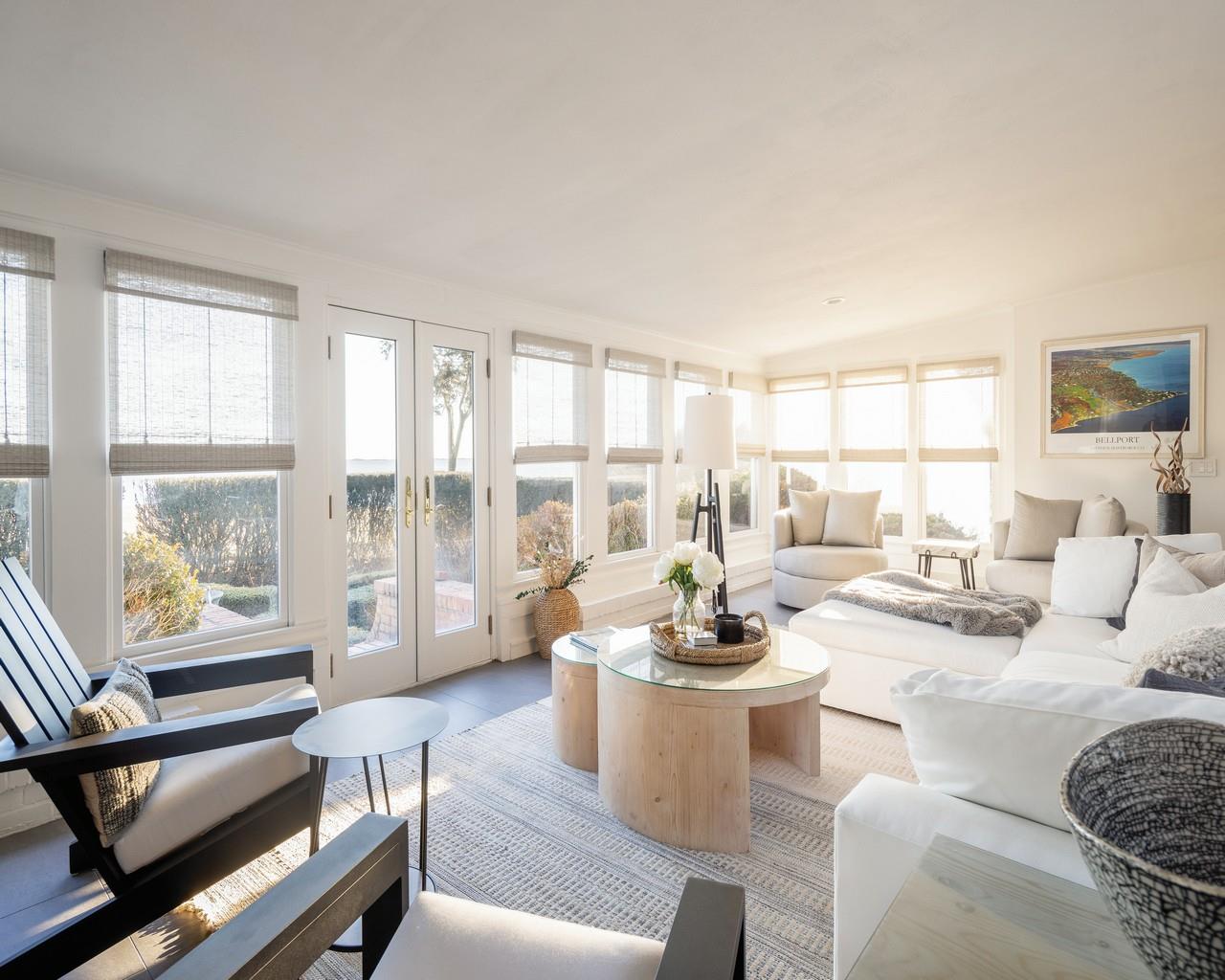 16 Point Road Bellport, NY 11713 - Photo 15 of 34 a living room with furniture and a large window
