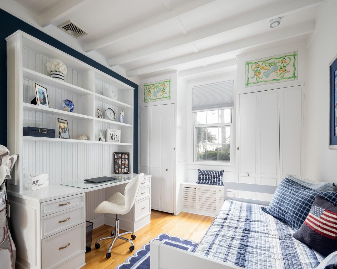 16 Point Road Bellport, NY 11713 - Photo 31 of 34 a room with furniture and a window