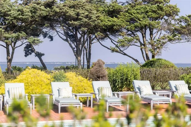 a view of an chairs and tables in the patio