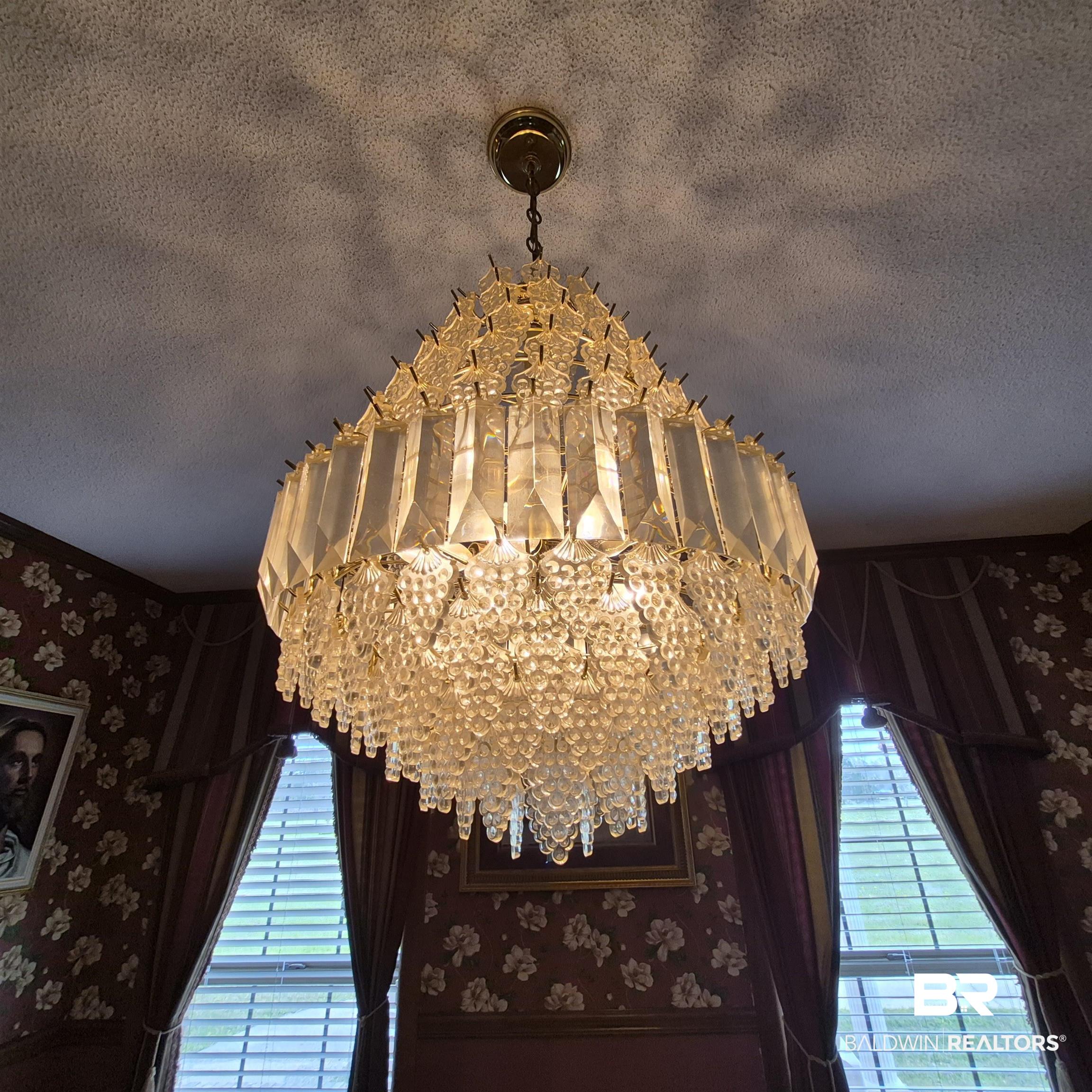 26635 Highway 41 Range, AL 36473 - Photo 20 of 74 Detailed view of wallpapered walls, a textured ceiling, and a chandelier