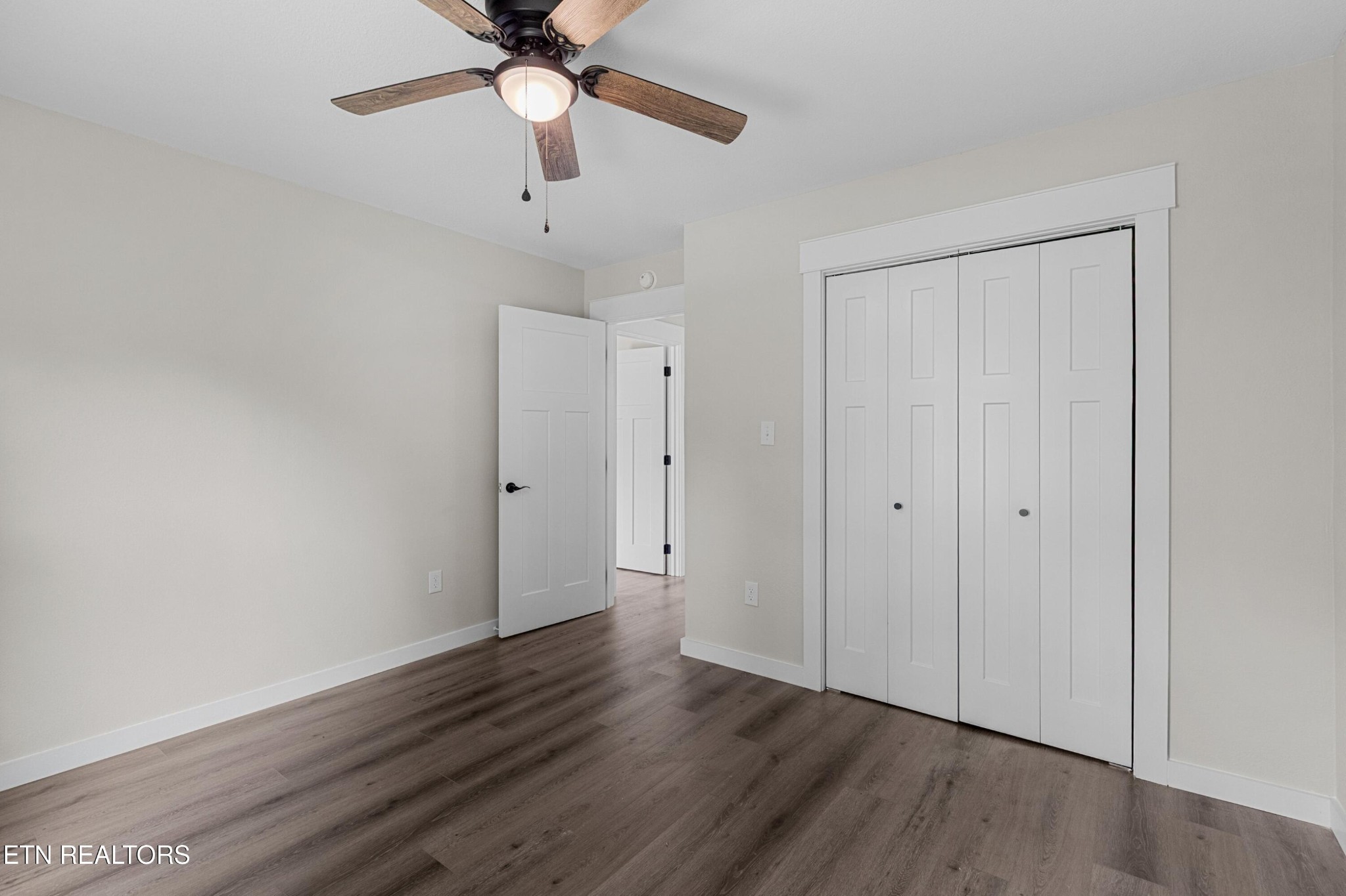 126 Double Cave Road Rutledge, TN 37861 - Photo 11 of 20 a view of an empty room with wooden floor