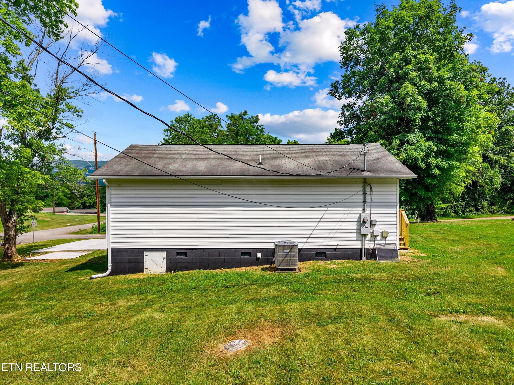 126 Double Cave Road Rutledge, TN 37861 - Photo 19 of 20 a view of a house with a yard