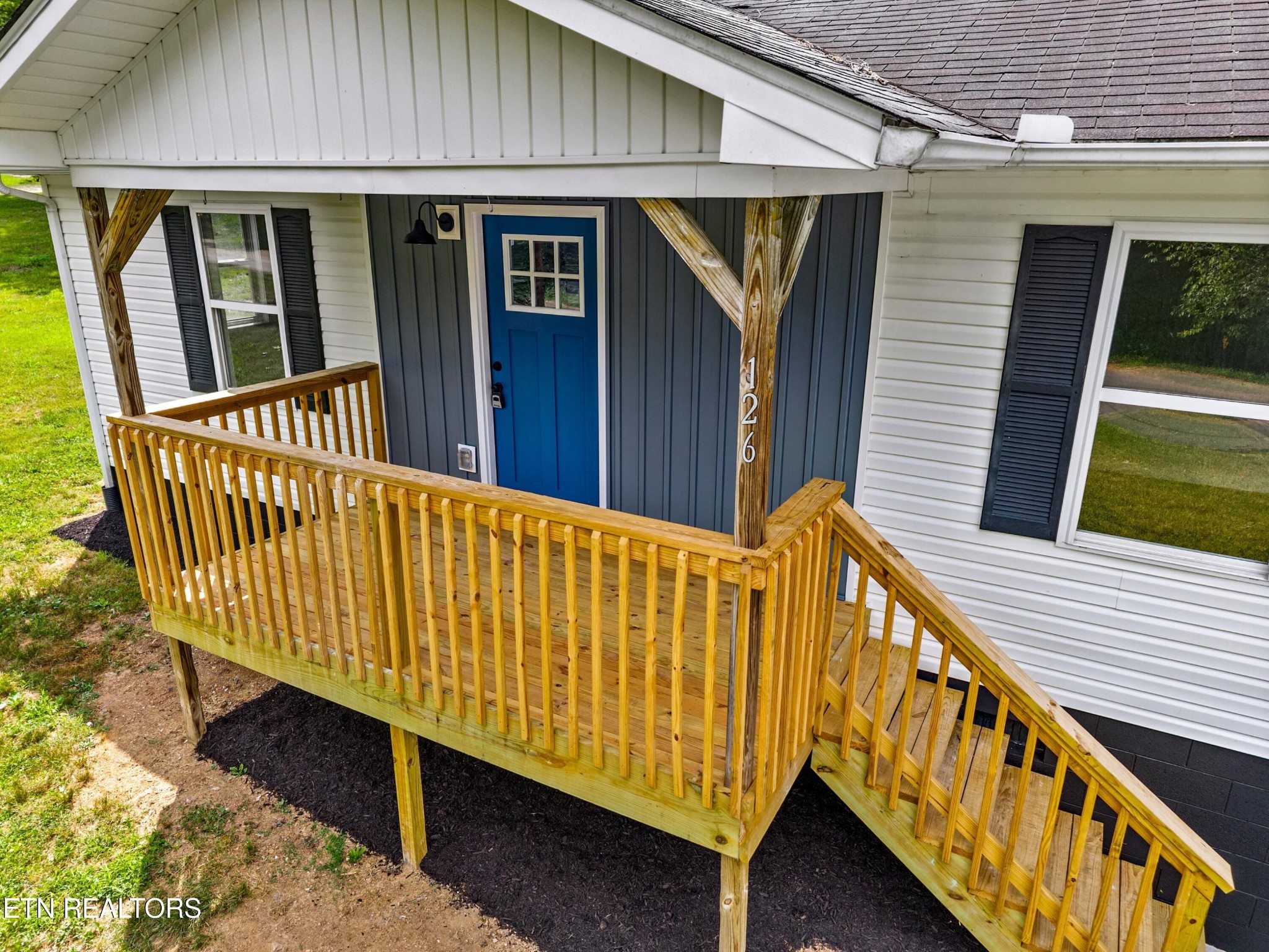 126 Double Cave Road Rutledge, TN 37861 - Photo 3 of 20 a view of a house with wooden stairs