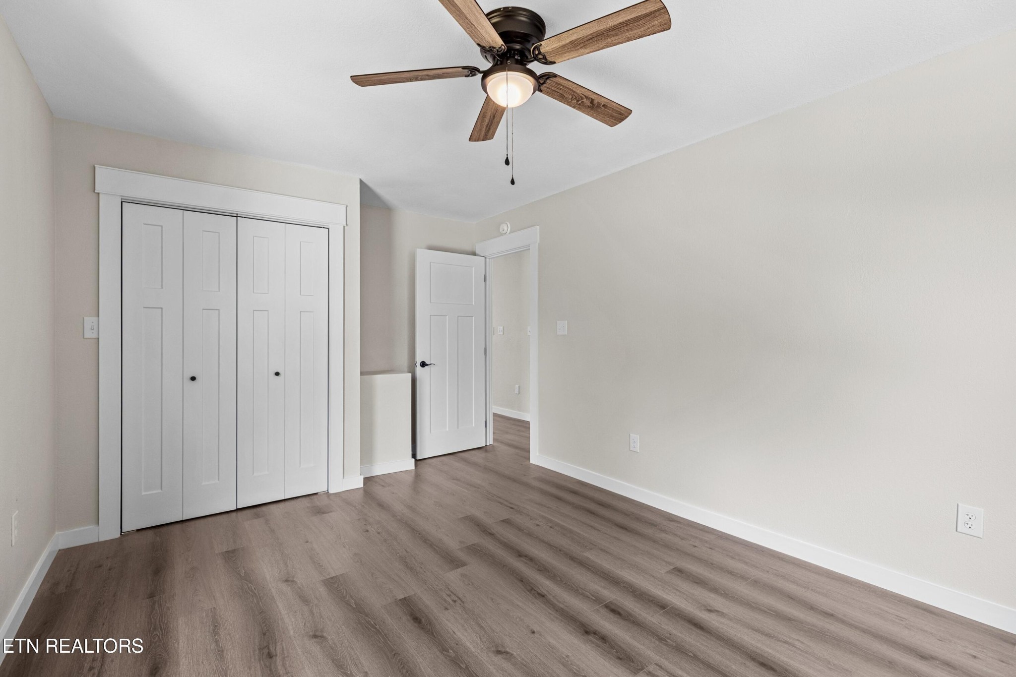 126 Double Cave Road Rutledge, TN 37861 - Photo 10 of 20 a view of an empty room with wooden floor