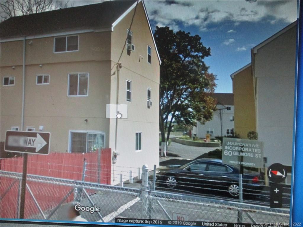 a car parked in front of a house