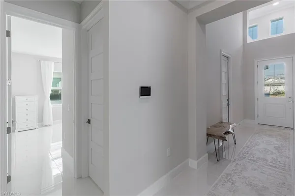 a view of a hallway with workspace