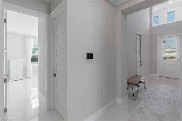 a view of a hallway with workspace