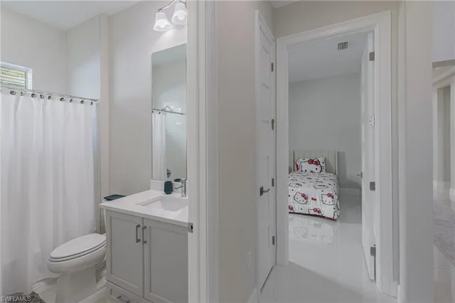 a bathroom with a sink and toilet