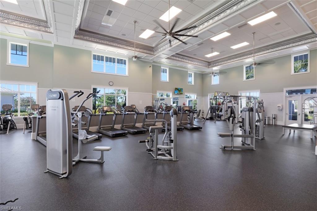 8982 Gustavia Court Naples, FL 34113 - Photo 42 of 44 a view of a room with gym equipment
