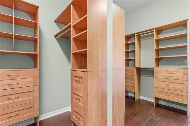 a bathroom with a sink double vanity and a mirror