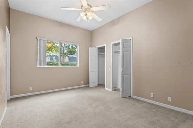 a bathroom with a toilet and a bathtub