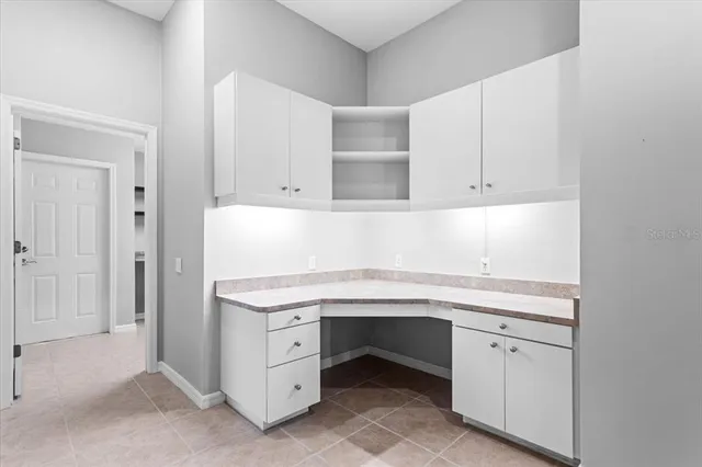 a view of a room with racks on the wall