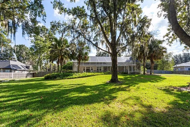 a view of a house with a big yard