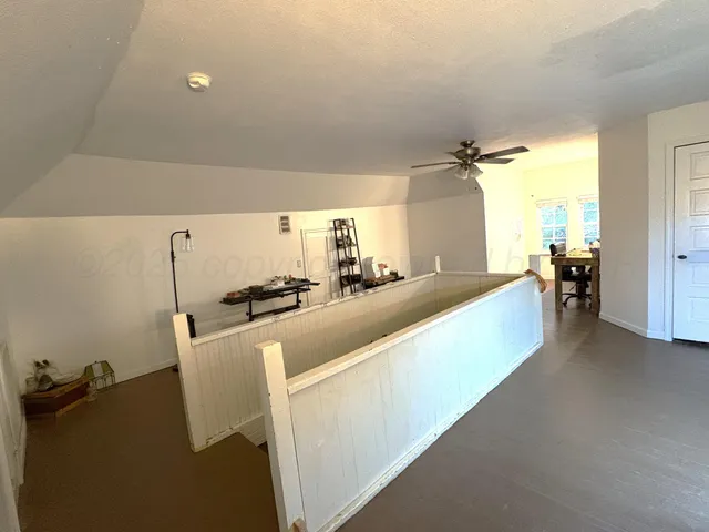 a view of a living room and dining room