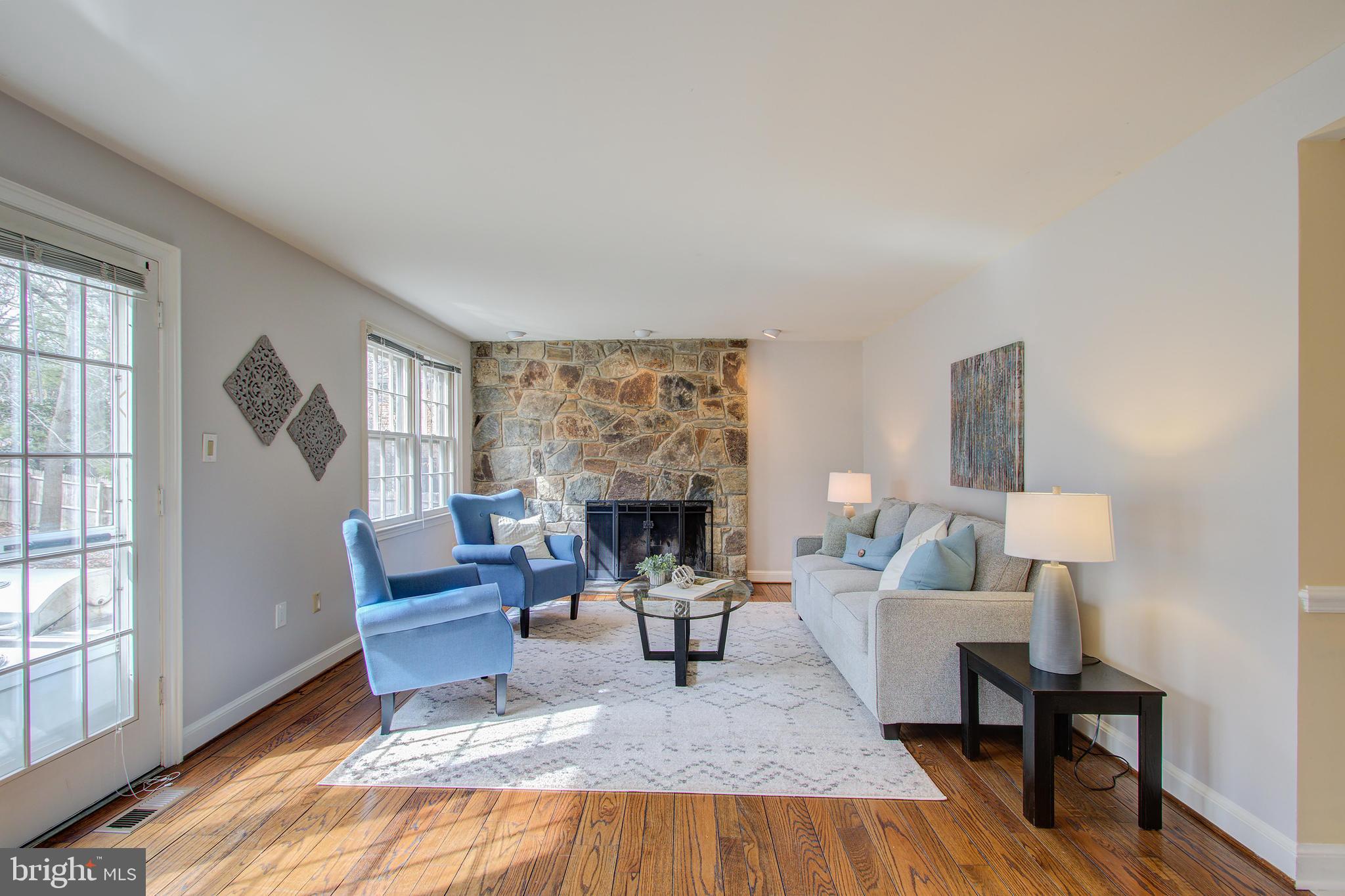 7008 Greentree Road Bethesda, MD 20817 - Photo 14 of 39 Family Room with Stone Fireplace