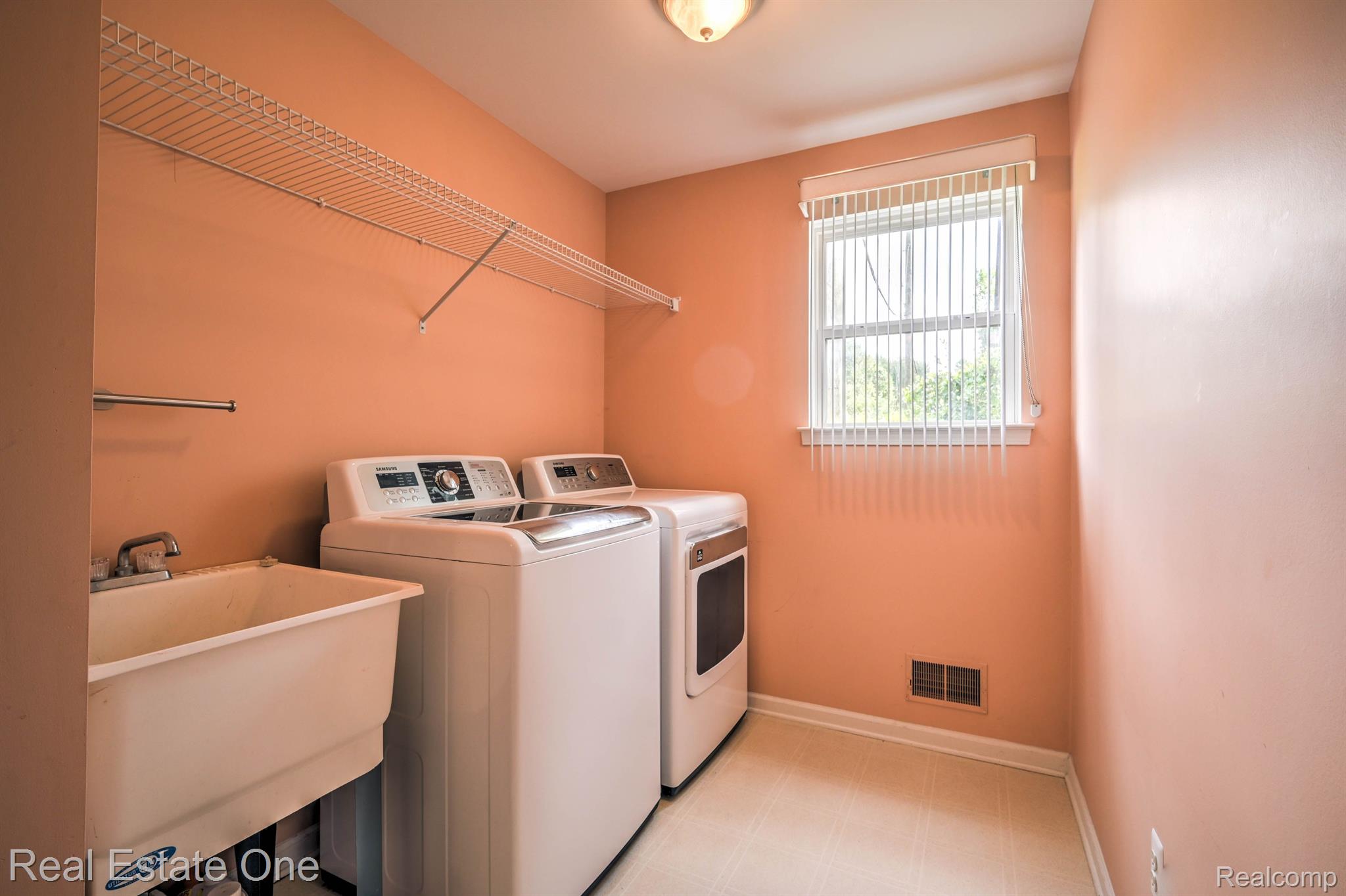 1400 Lee Wood Ridge Road Walled Lake, MI 48390 - Photo 18 of 42 Entry Level Laundry Room