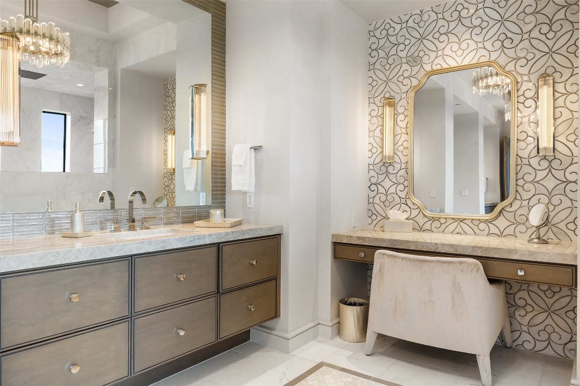 4901 Mirador Drive Austin, TX 78735 - Photo 13 of 35 a bathroom with a double vanity sink and a mirror