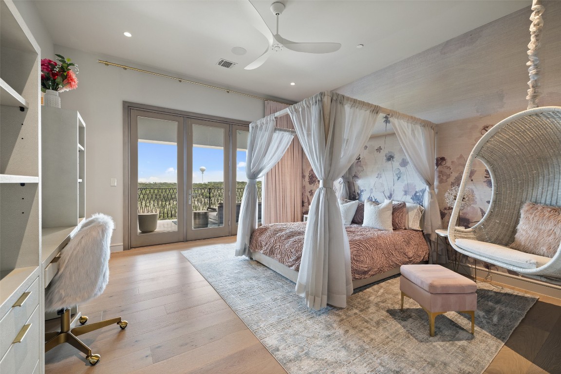 4901 Mirador Drive Austin, TX 78735 - Photo 23 of 35 a living room with furniture and a floor to ceiling window