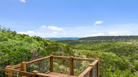 a view of balcony with furniture