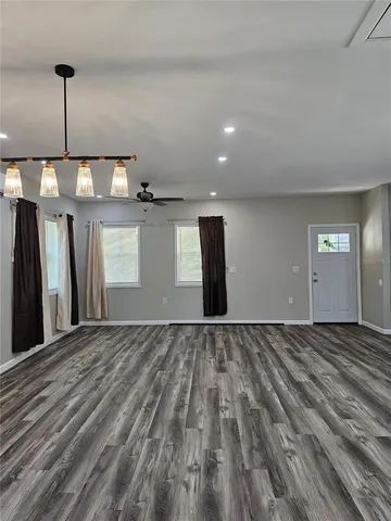 a view of a livingroom with a staircase