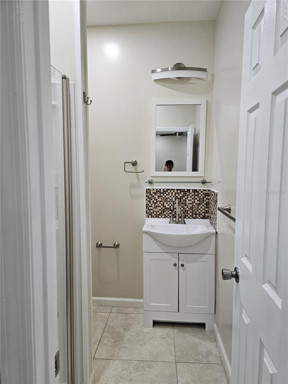 20805 Sheldon Street Orlando, FL 32833 - Photo 23 of 33 a bathroom with a sink and a mirror